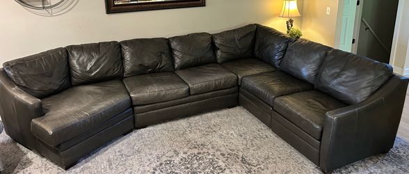 Leather Brown sectional with Power recliner TomsPrice Furniture