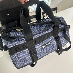 Supreme x The North Face Studded Duffle