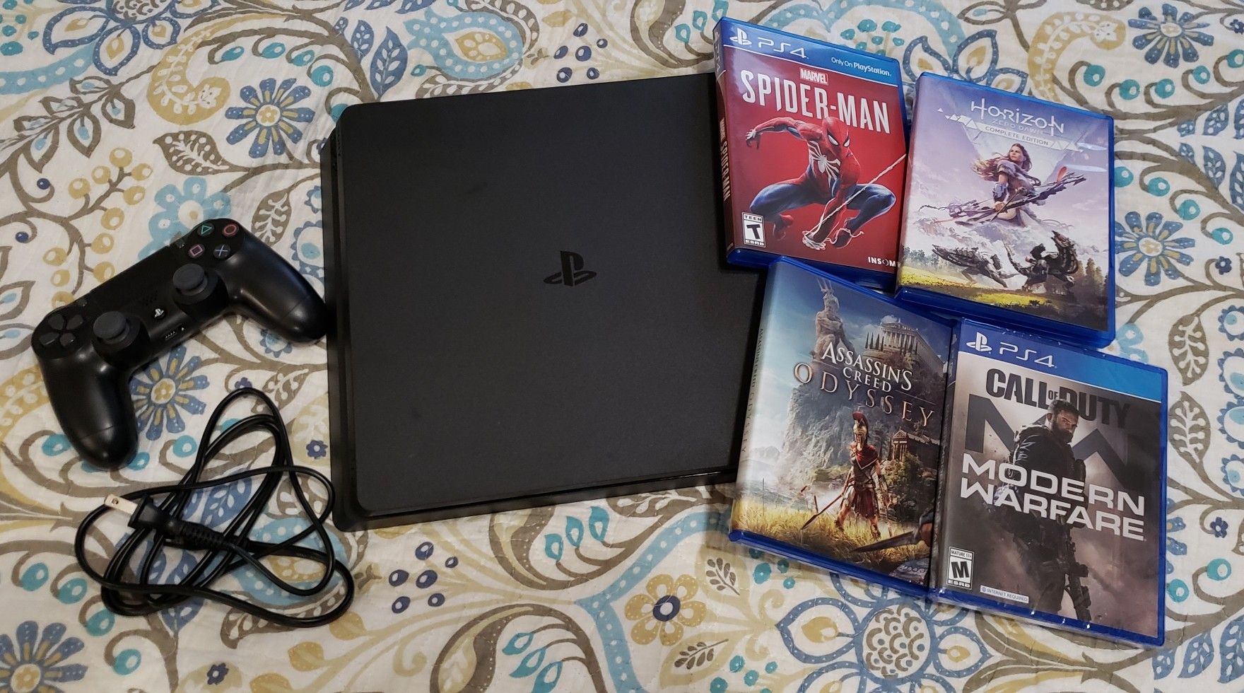 PS4 slim 1TB edition with Call of Duty Modern Warfare, Assassins Creed Odyssey, Marvel Spider-Man & Horizon Zero Dawn