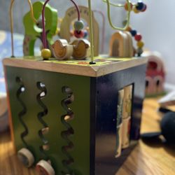 B. Toys Wooden Activity Cube - Zany Zoo