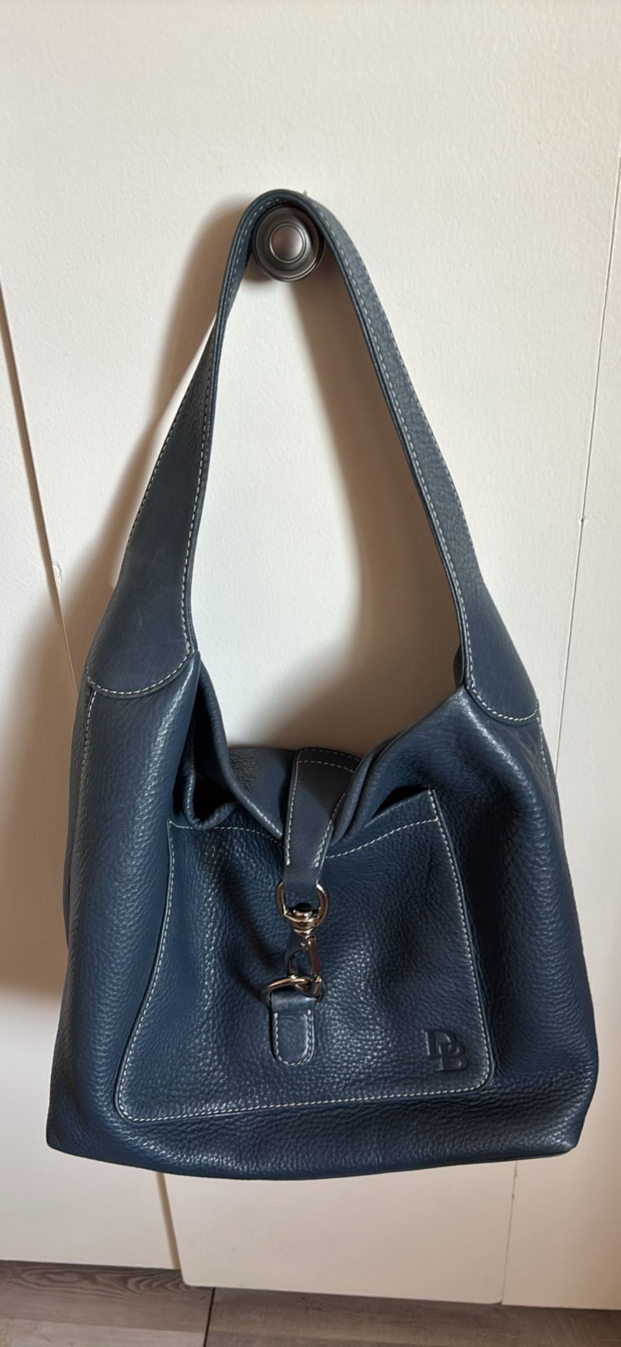 Dooney and Bourke navy blue hobo silvertone hardware soft pebble leather hand bag purse like new
