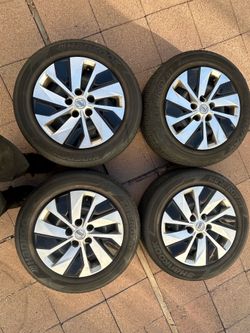 215/60/16 Nissan wheels and tires