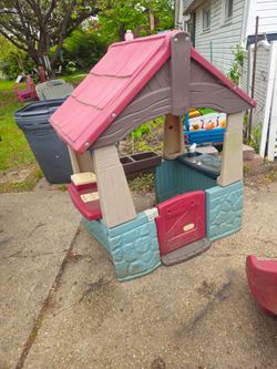 Price is firm.. children's potting shed playhouse