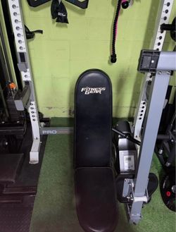 200lbs weight plates, squat/bench rack, adjustable bench (FID), barbell & ez curl bar