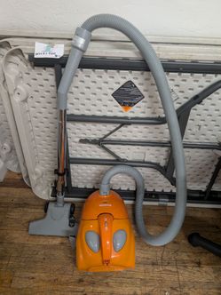Retro orange hoover vacuum