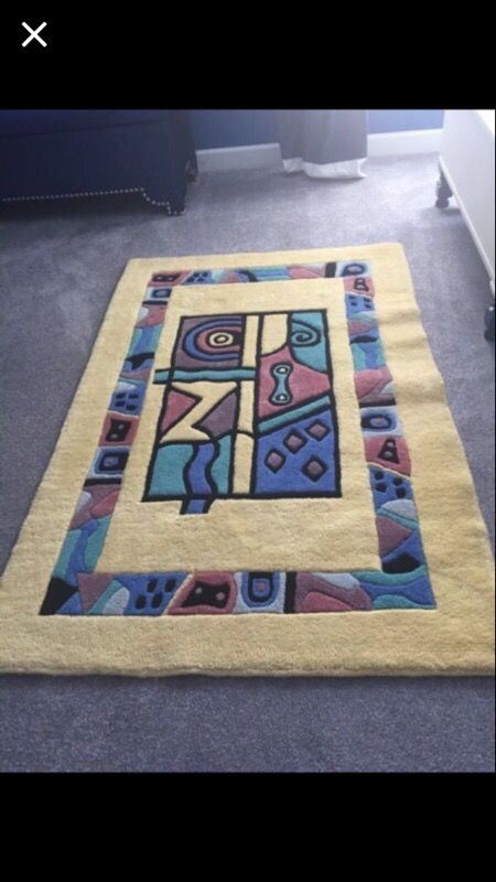 41"x63" all wool carpet excellent condition