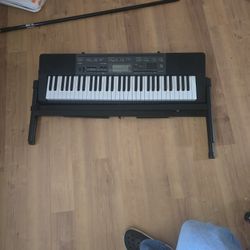 Piano With Stand Like New 
