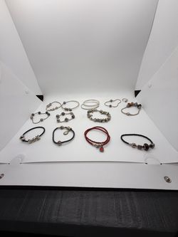12 Sterling Silver 925 Pandora Bracelet Lot w/one Ring. & 14k over 50 charms.