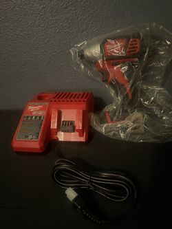 Milwaukee Drill And Charger (Brand New)