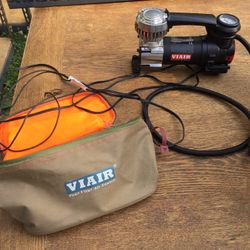 Orange and Black ViAir 8P4 12V Portable Compressor with original bag and cord. Great condition. 