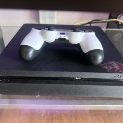 PS4 with controller  and games
