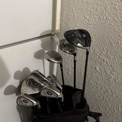Mens right handed golf club set. Taylor driver and woods
