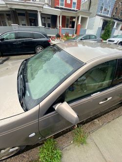 Gold/Tan Sedan Car
