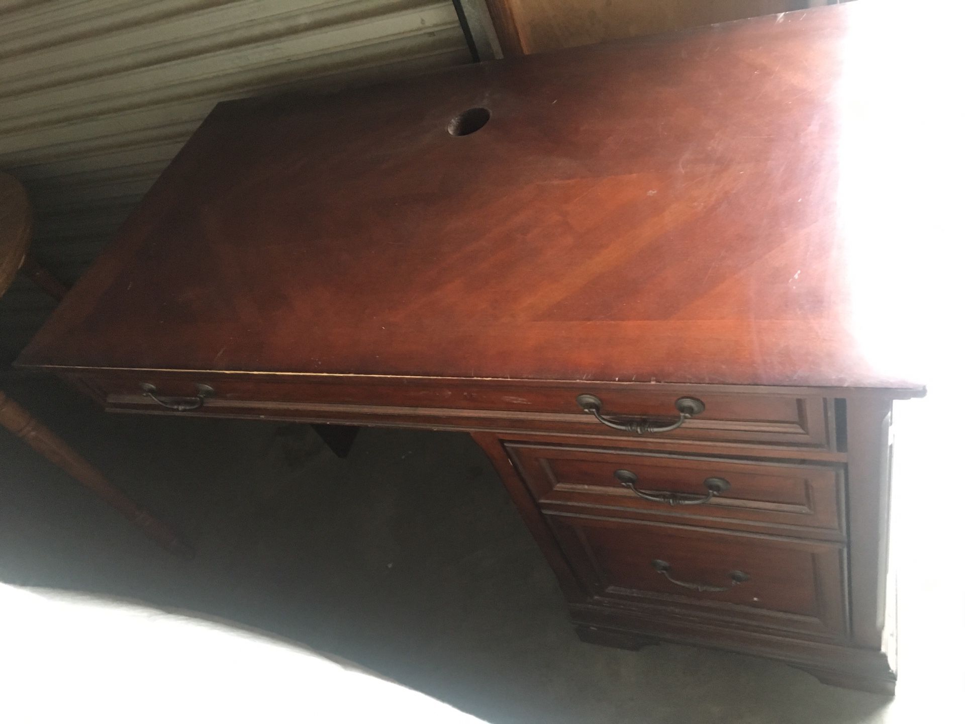 Antique looking wood L-shaped desk. 150