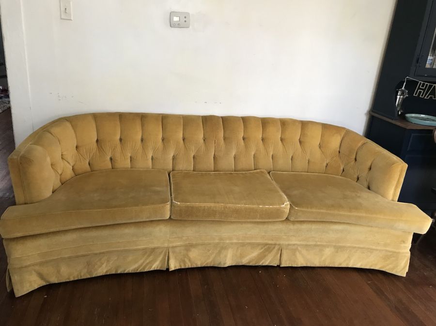 Vintage yellow velvet sofa