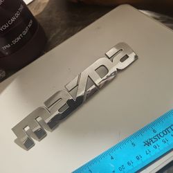 00-06 Mazda Rear Trunk Emblem