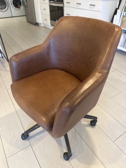 Two (2) West Elm Leather Rolling Chairs