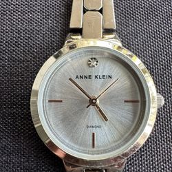 ANNE KLEIN SILVER TONE GENUINE DIAMOND DIAL WRISTWATCH.