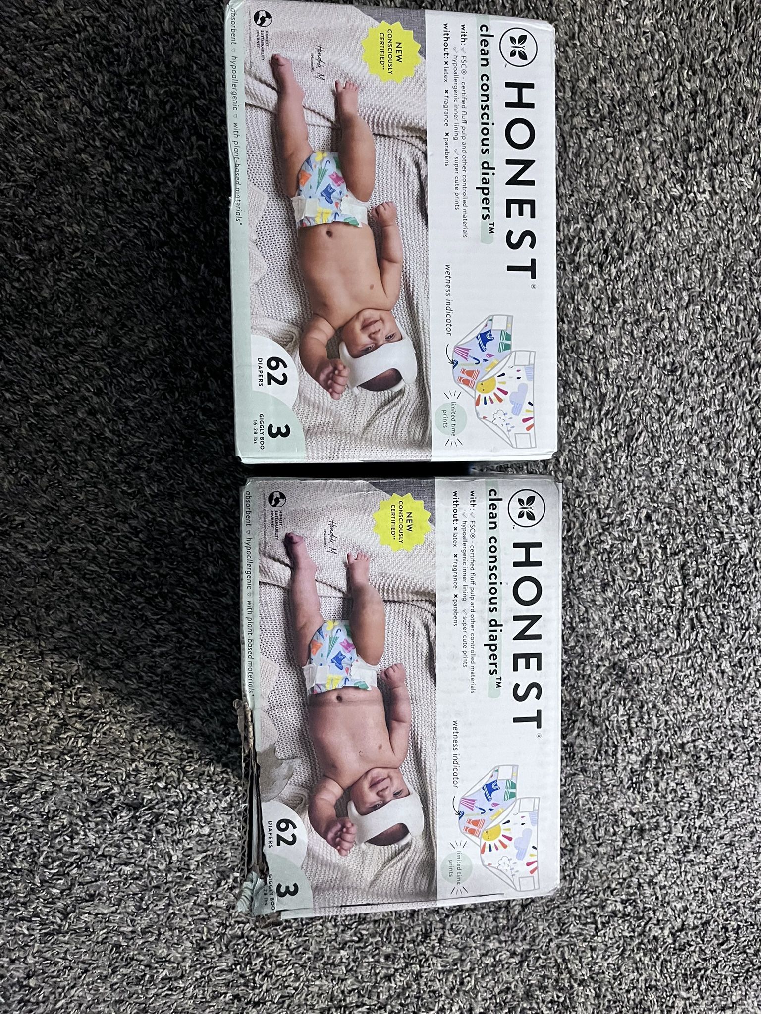 Two Boxes Of Diapers 