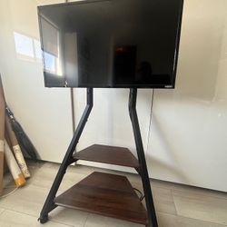 VIZIO 32 inch Smart LED HDTV with Corner Rolling TV Stand.