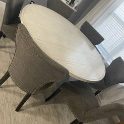 Round kitchen table with chairs