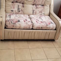 Leather Love Seat$75