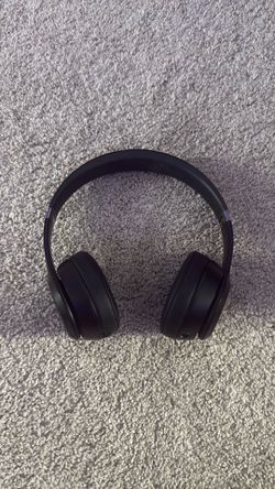 Black over the ear Beats Solo 4’s