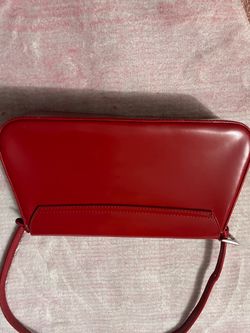 Bolsa elegante color rojo vino, acabado brillante
