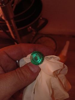 Round Faceted Green emerald
