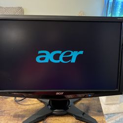 Acer monitor with cable and power cord.