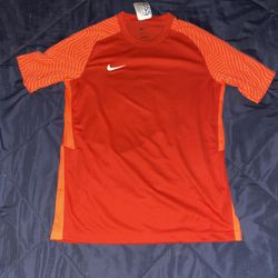 Red/orange nike compression shirt