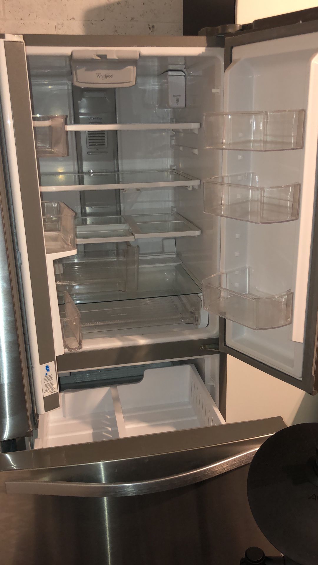 Whirlpool Refrigerator good condition was used only for 6 months.