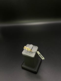 Women’s gold ring with diamond stones