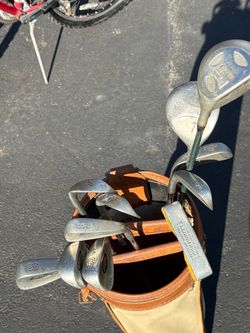 (11) PRIMA II Starter golf clubs w/ bag