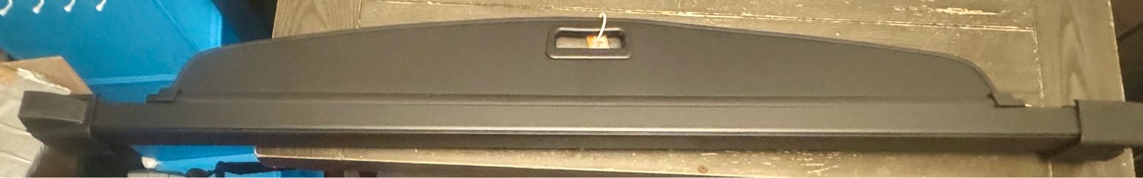 Keep your luggage secure and out of sight with this genuine OEM Volkswagen Atlas Retractable Cargo Cover.This is an original factory part, not a cheap