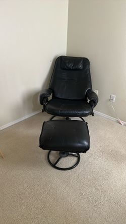 Black faux leather reclining chair and stool