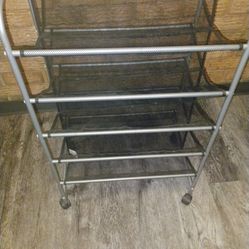 Rolling shoe rack holds 30. Pickup only cash