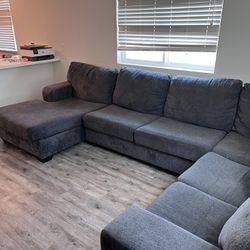 Large gray sectional Couch