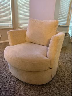 Cream swivel chairs (2)