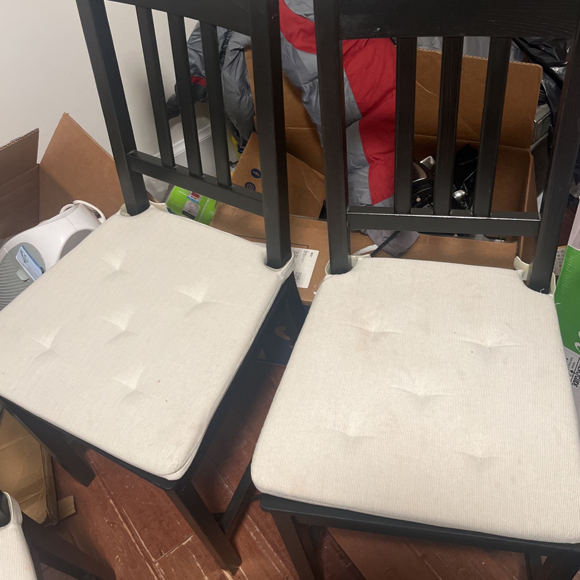 4 IKEA Chairs In Black With Seat Covers 