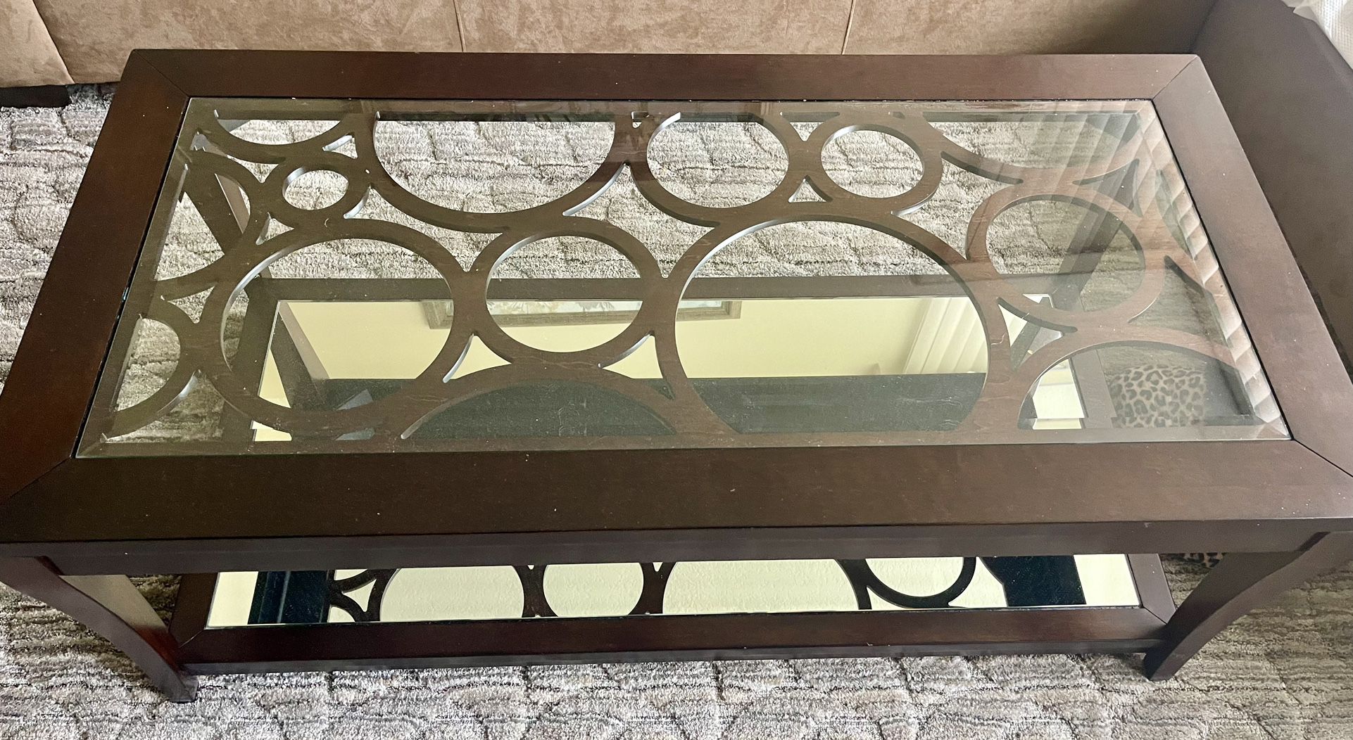 Dark Brown Wooden Coffee Table With Mirror And Circles 