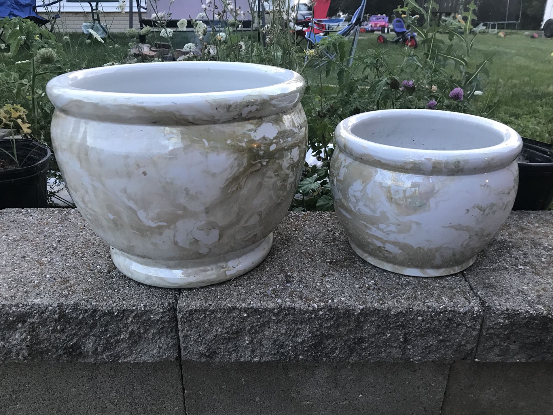 Two matching flower pots