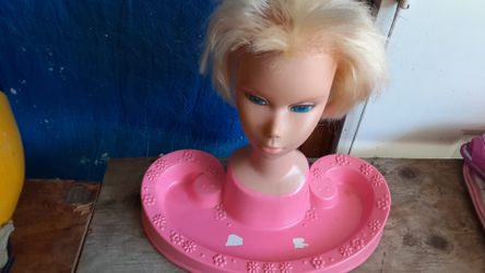 Barbie head doll toy