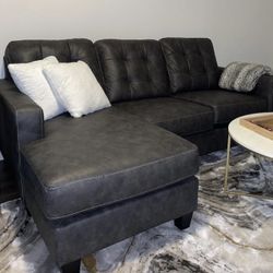 Gray Ashley HomeStores 85” Venaldi Sectional Sofa with Reversible Chaise