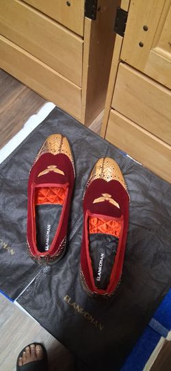 Red and gold dress shoes