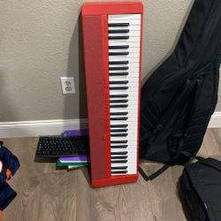 Red Casio Keyboard 