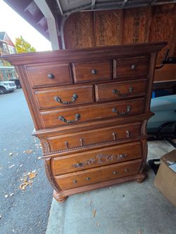 Tall Wood Chest of Drawers with Carved Detail