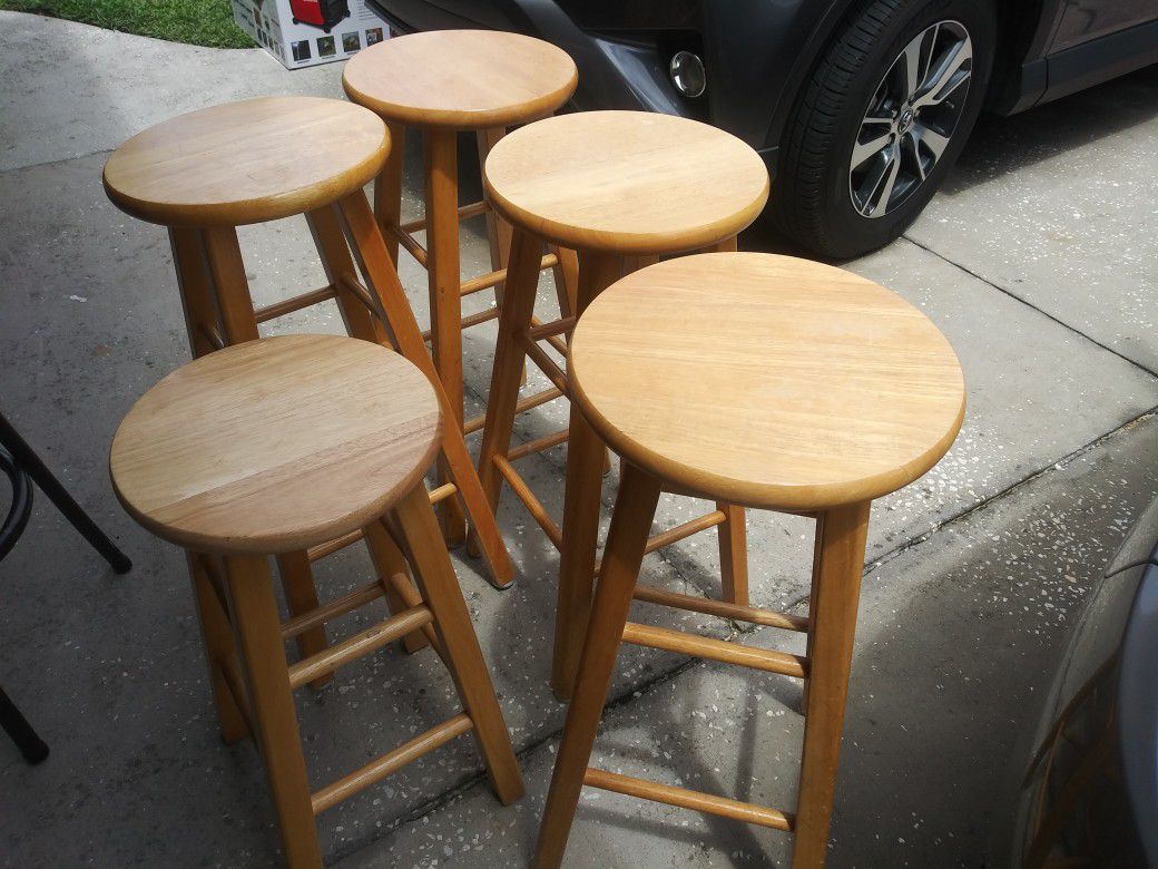 Four wooden high chairs