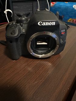 Canon EOS Rebel T5i DSLR Camera with EF-S 18-135mm Lens, Battery & Charger