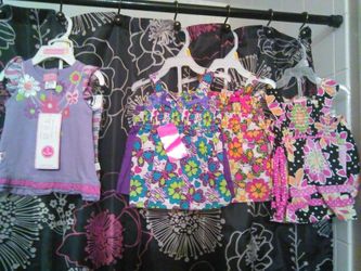 Little Girls new outfits with tags different sizes